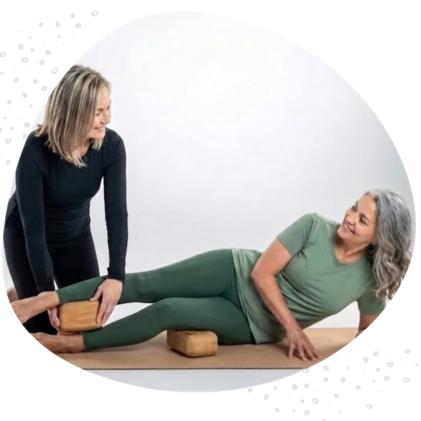 Helen guiding a seated client through Block Therapy™ fascia release